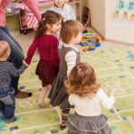 rear-view-people-standing-outdoors-2